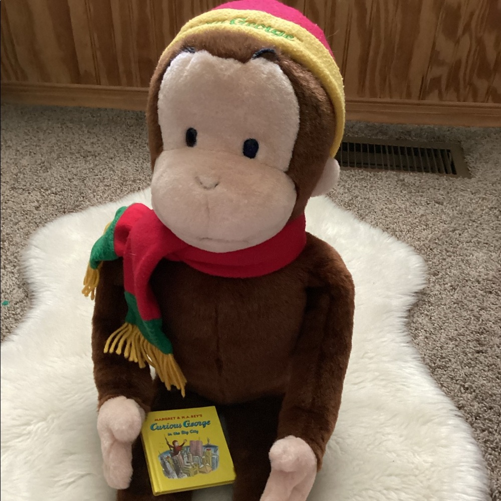 Curious George plush with book